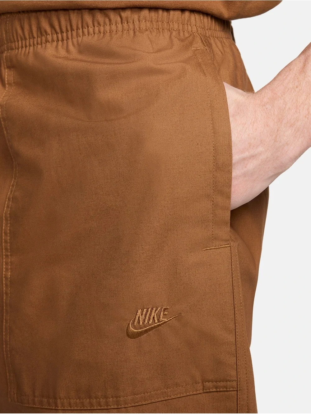 Nike loose fit tapered club pants size S